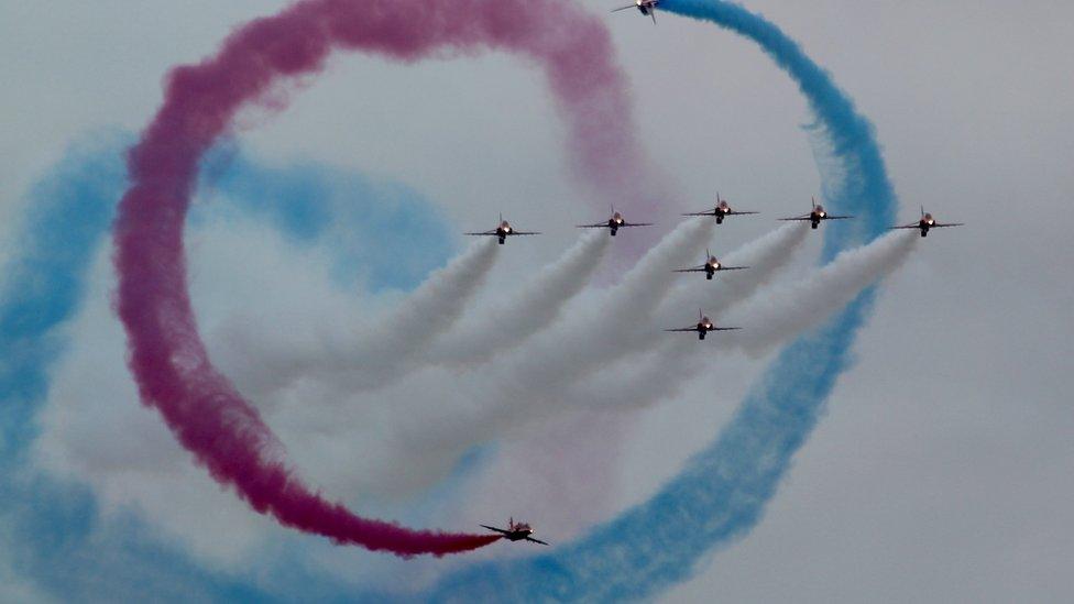 The Red Arrows flying in formation above Swansea