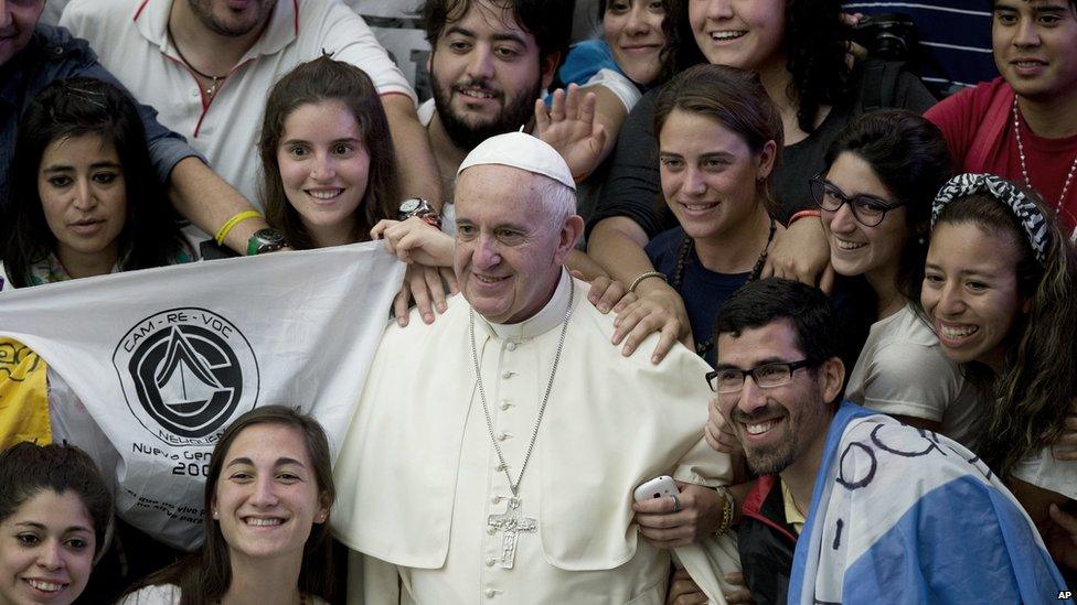 Pilgrims from Argentina posed with the Pope at the weekly audience