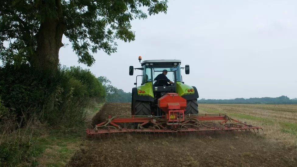 Farmer on tractor