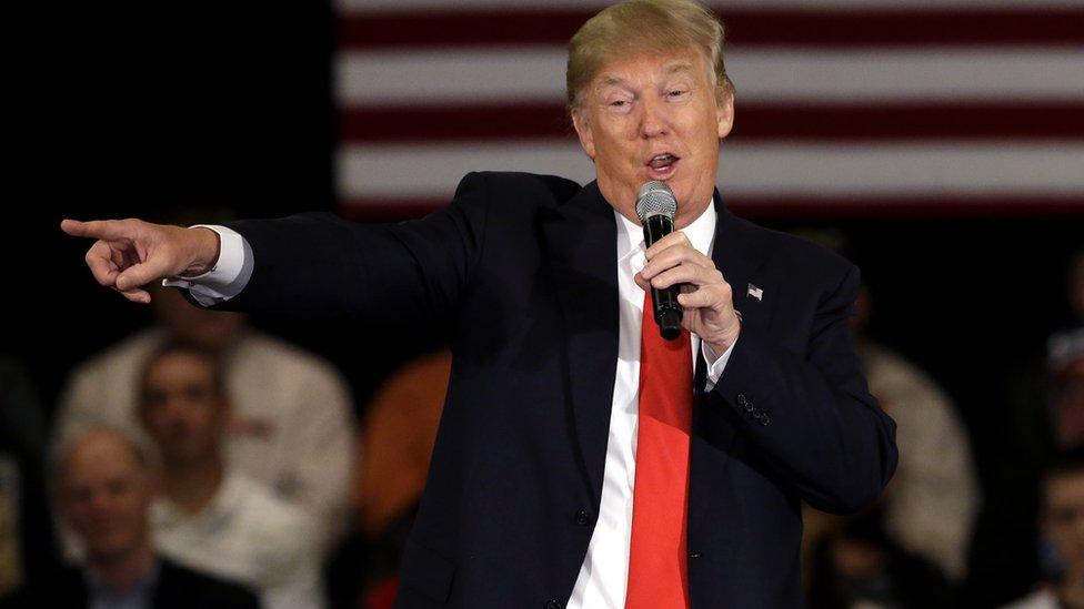 Republican presidential candidate Donald Trump points as he speaks at a campaign stop, Wednesday, March 30, 2016, in Appleton, Wis