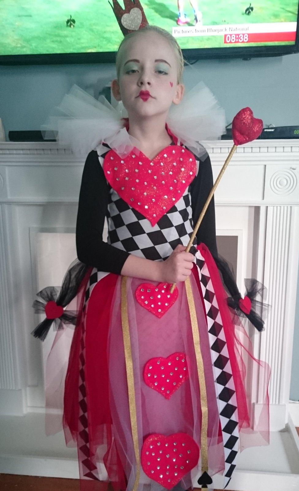 Ruby from London taking her role seriously as the Queen of Hearts from Alive in Wonderland. Her mum made this costume!