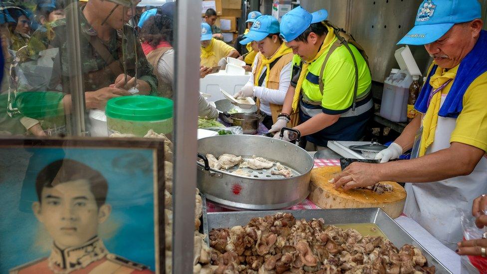 Volunteers prepare chicken rice for rescuers ^ family members at Khun Nam Nang Non Forest Park on July 05, 2018 in Chiang Rai, Thailand.