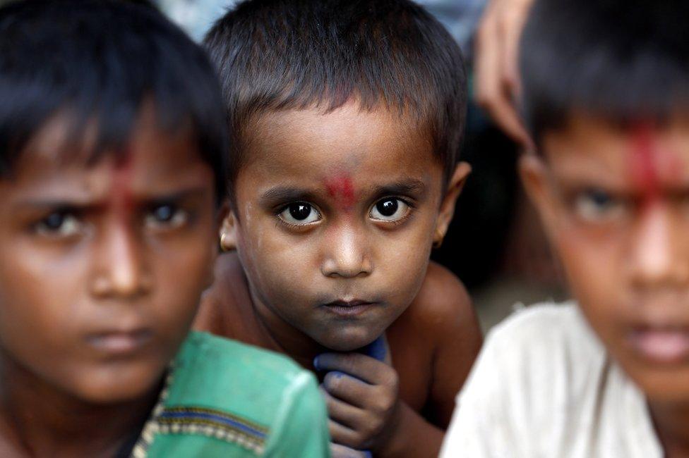 Hindu children gather at the temporary camp in Maungdaw township, Rakhine State, western Myanmar, 6 September 2017.