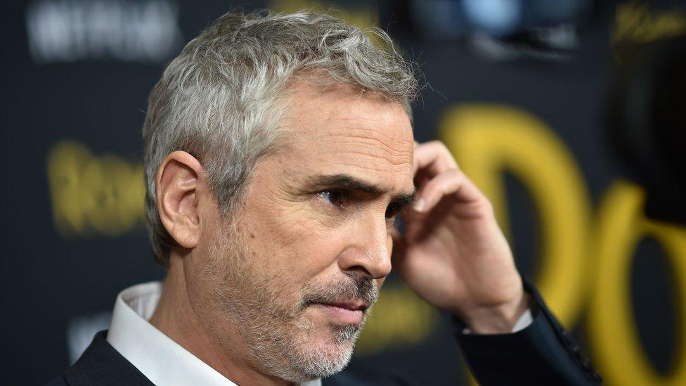 Mexican director Alfonso Cuarn arrives for the Los Angeles premiere of "Roma" at the Egyptian theatre in Hollywood on 10 December, 2018.