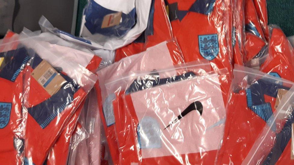 Fake England shirts in plastic packaging