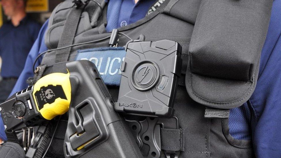 Police officer wearing body-worn video camera