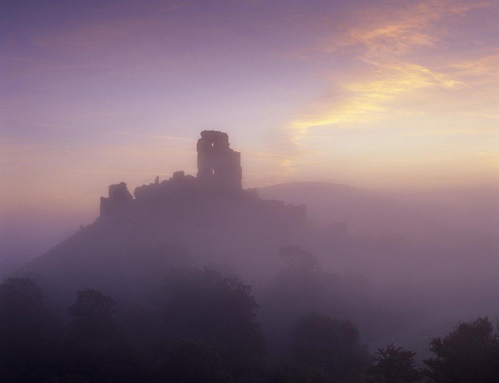 Corfe Castle seen through lots of mist