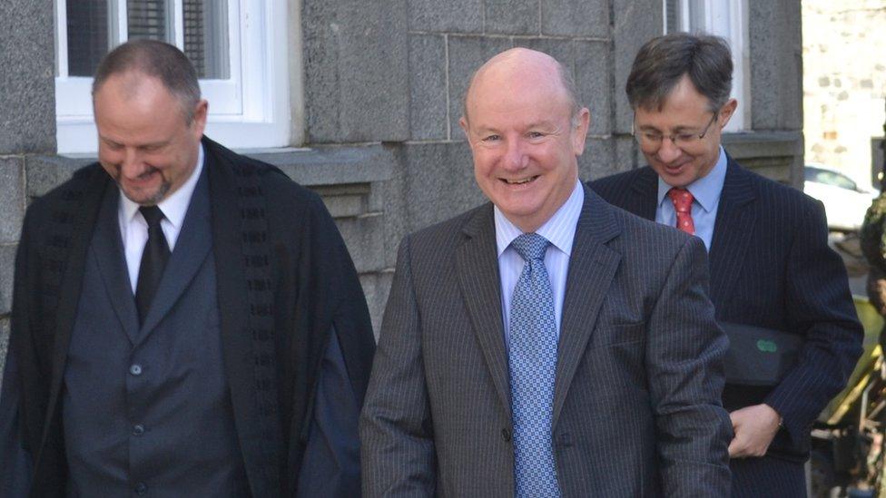 Air Marshal Peter Walker heading into Guernsey's Royal Court for a meeting of the States of Guernsey, behind him is ADC Major Marco Ciotti