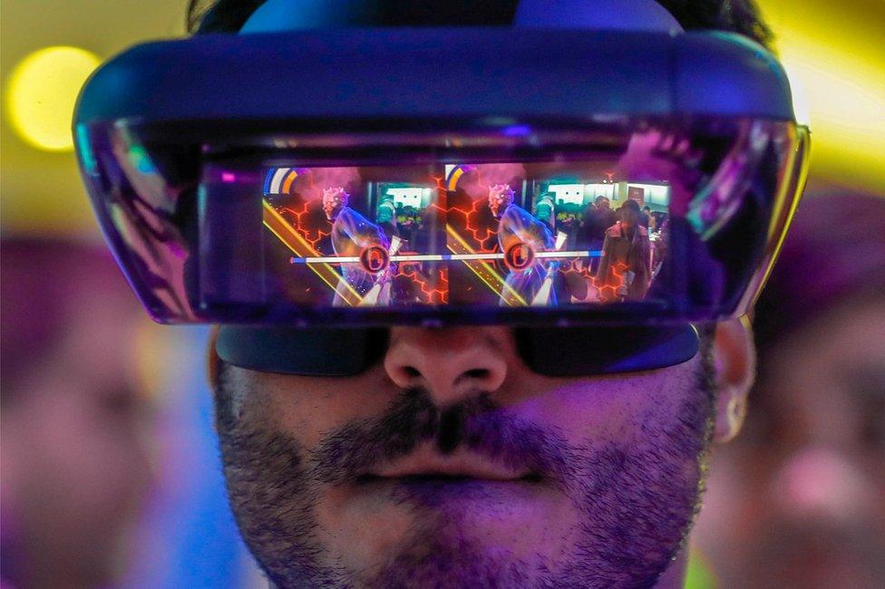 Man wearing Lenovo AR glasses