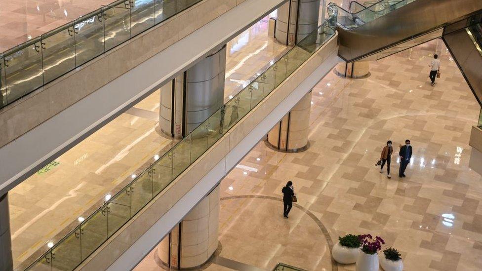 A quiet shopping mall in Wuhan in April, after many lockdown restrictions have been lifted