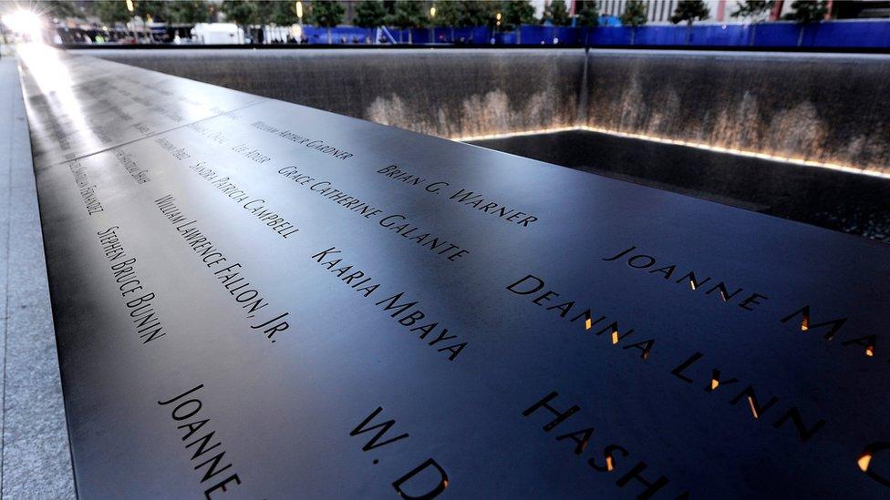 A view of the bronze panels bearing the names of the victims