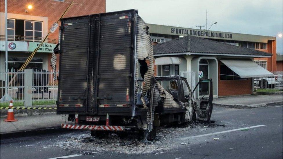 View of a truck set on fire in the aftermath of a bank robbery in Criciuma, Brazil, 01 December 2020.