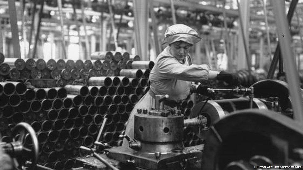 A woman working in a munitions factory