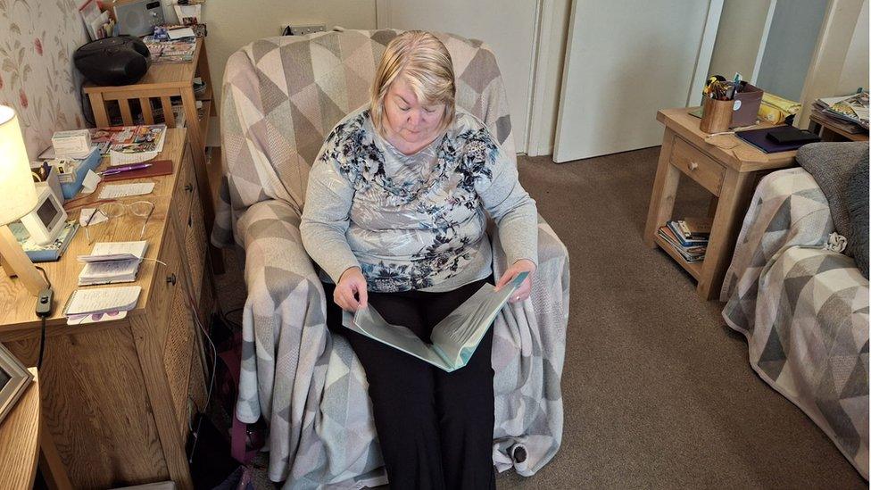 Lady looking through records