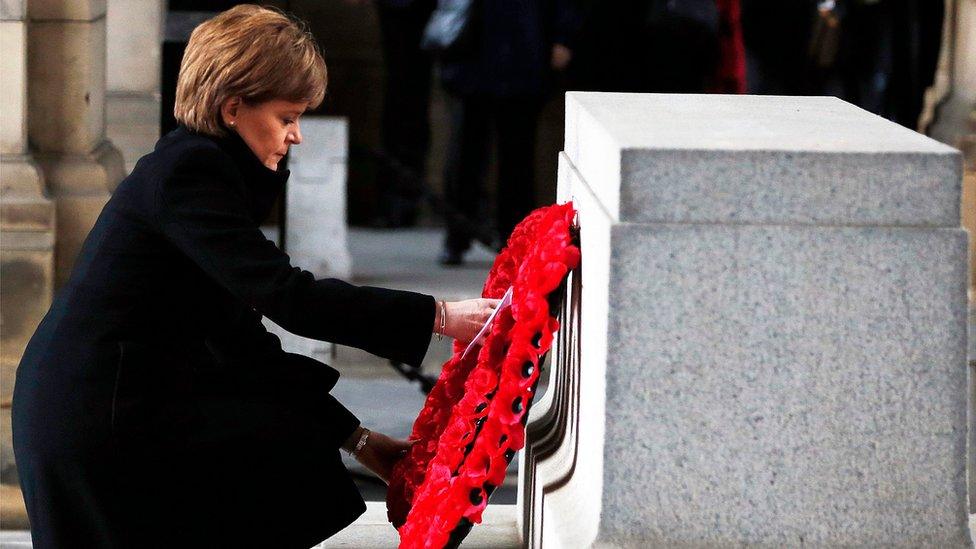 Scotland's First Minister Nicola Sturgeon laying a wreath at the Stone of Remembrance in Edinburgh