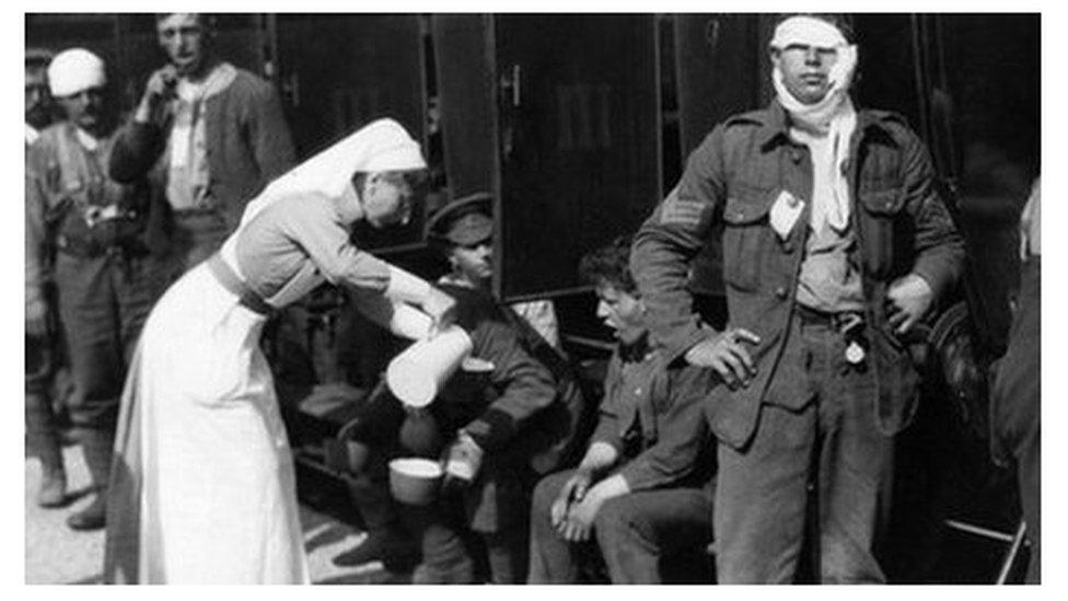 Nurse treats soldiers in World War One