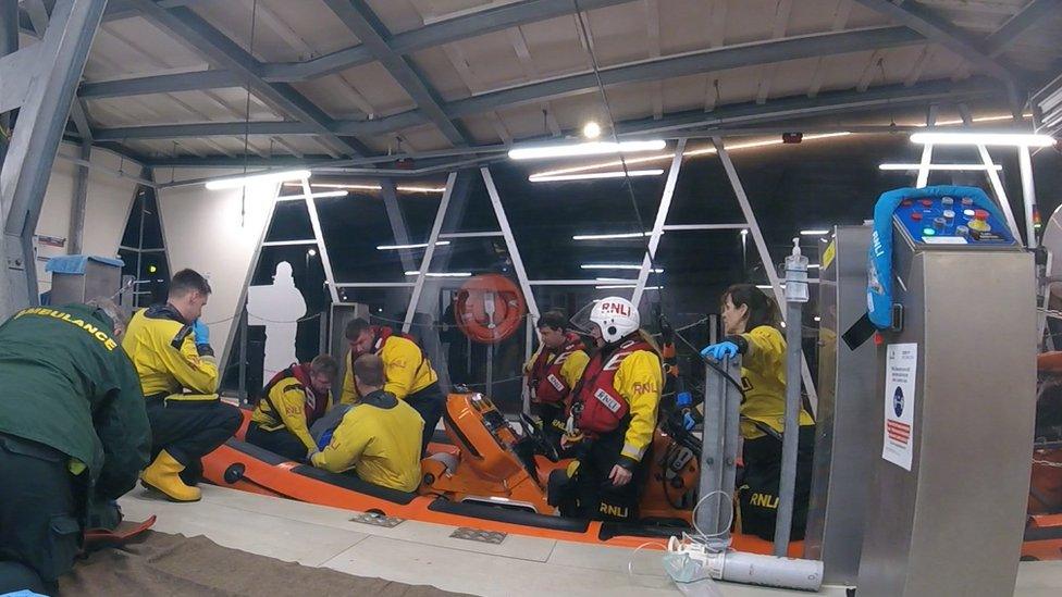 RNLI attending to the casualty