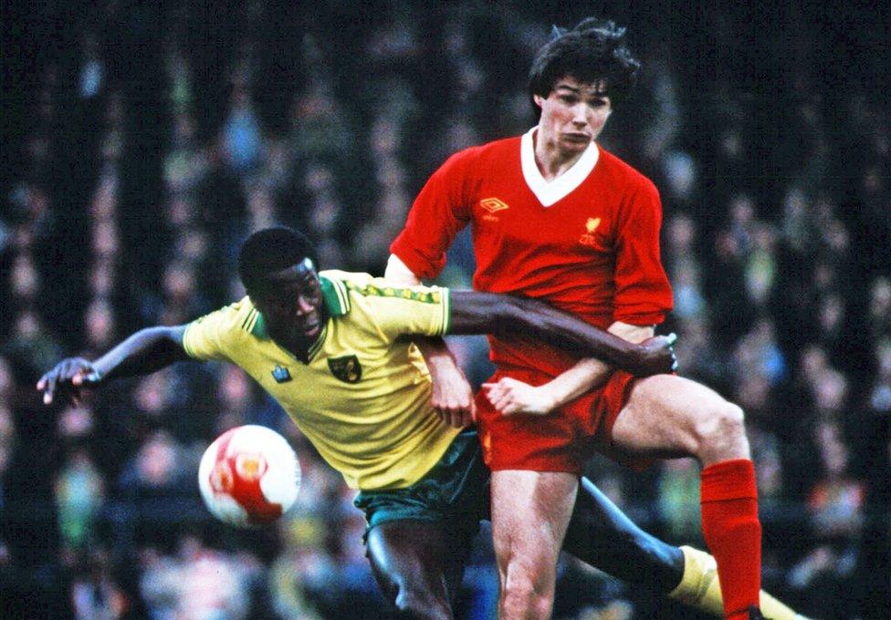 Justin Fashanu and Alan Hansen in match between Norwich and Liverpool in 1980