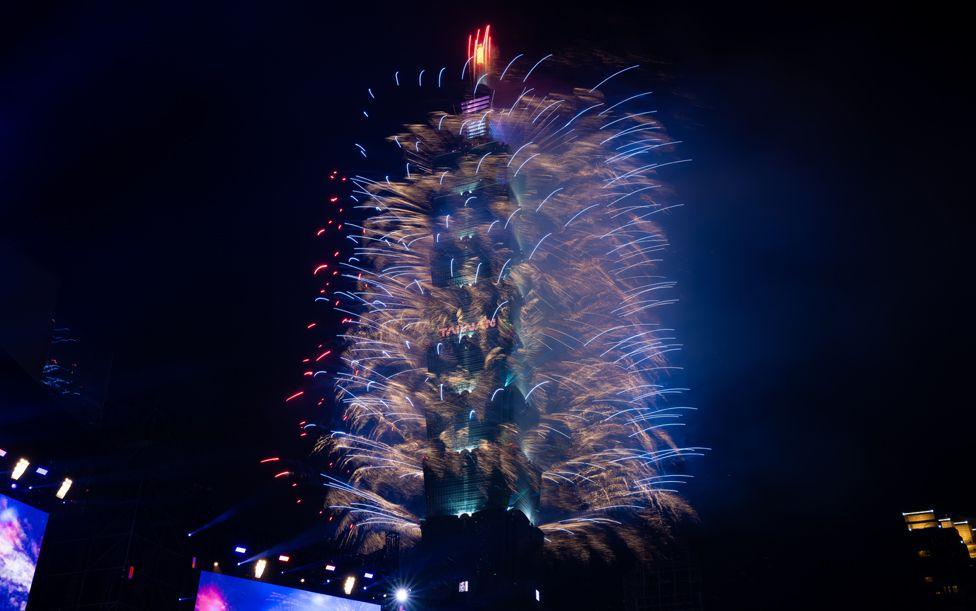 Fireworks light up the Taiwan skyline and Taipei 101 during New Year's Eve celebrations on January 01, 2025 in Taipei, Taiwan.