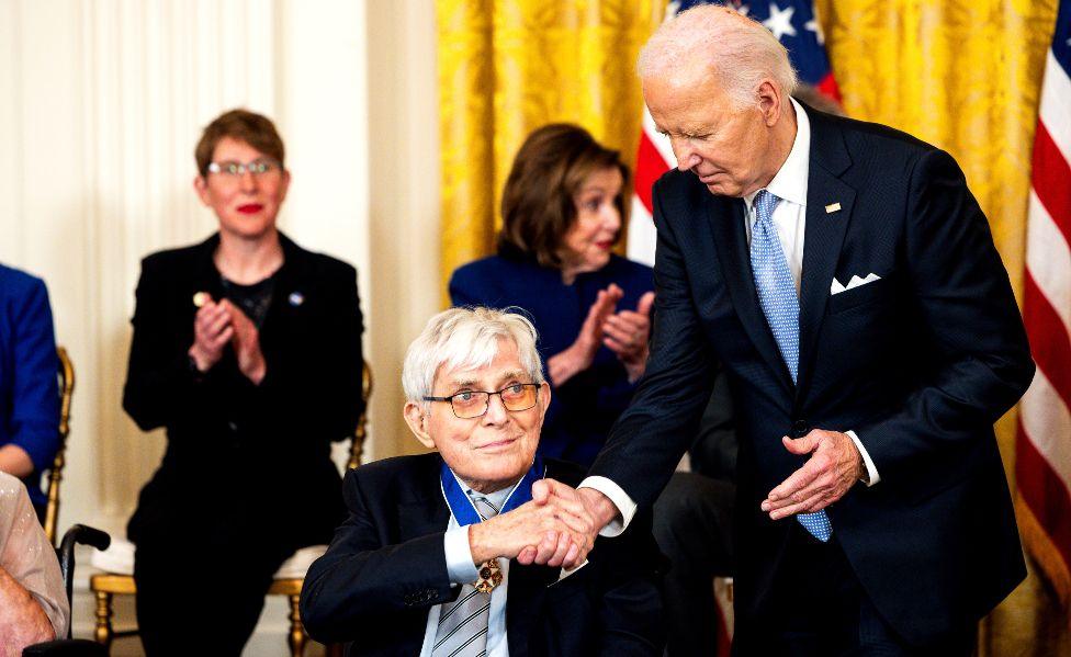 US President Joe Biden, right, shakes hands with journalist Phil Donahue during a medal of freedom ceremony in the East Room of the White House in Washington, DC, US, on May 3. The Presidential Medal of Freedom is the nation's highest civilian honor, presented to individuals who have made exemplary contributions to the prosperity, values, or security of the United States.