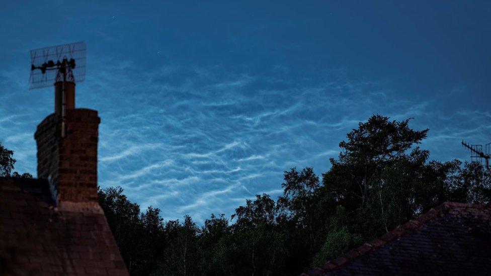 Night clouds above a chimney