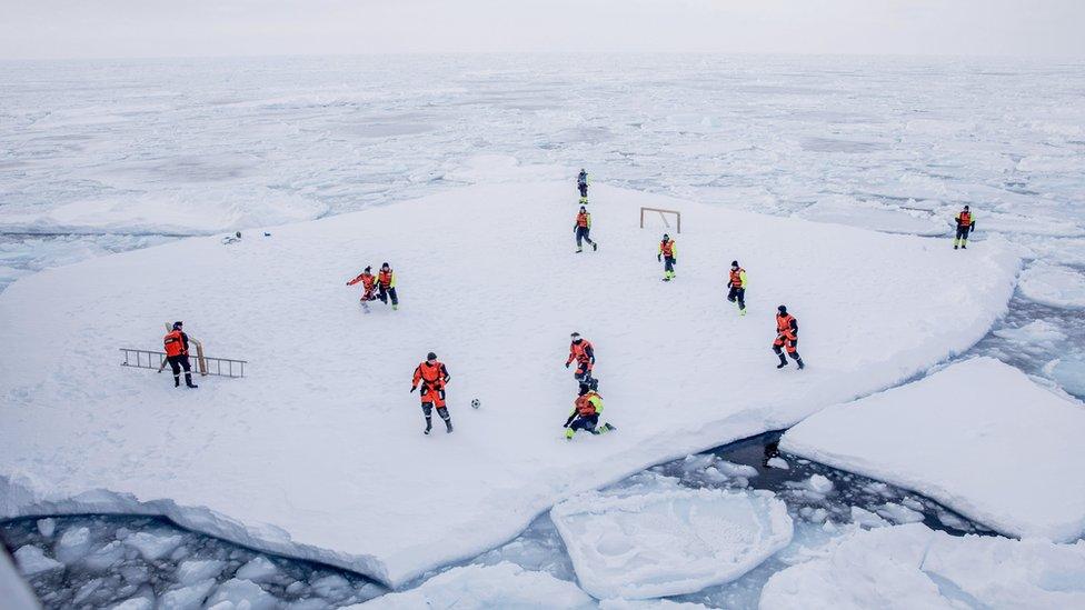 Football match on ice near Greenland