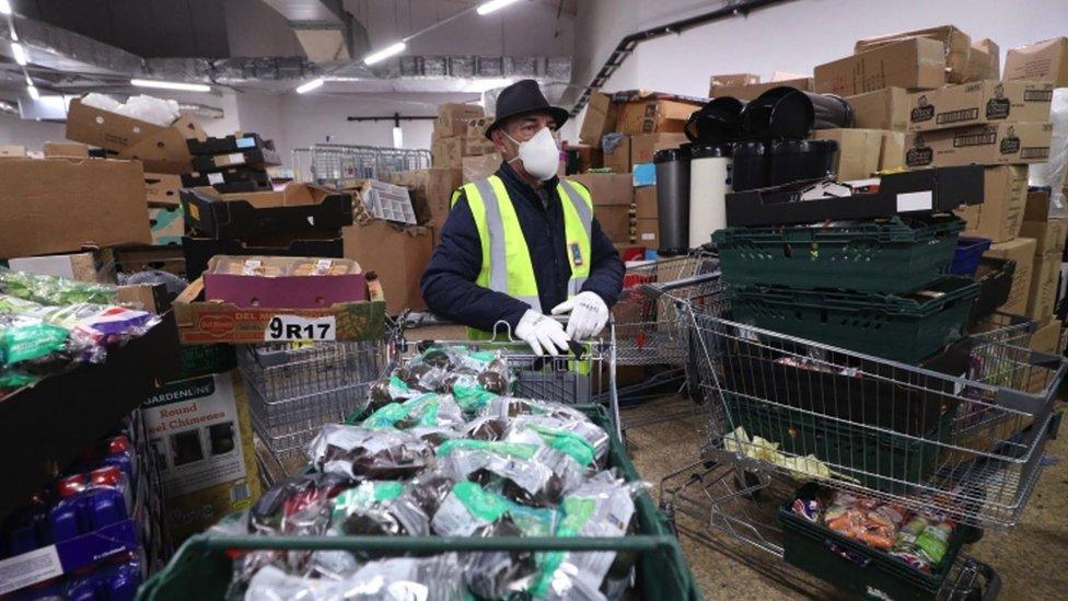 Man working at a food bank