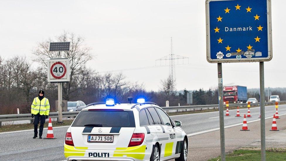 Danish Police officers check vehicles at the border town of Padborg