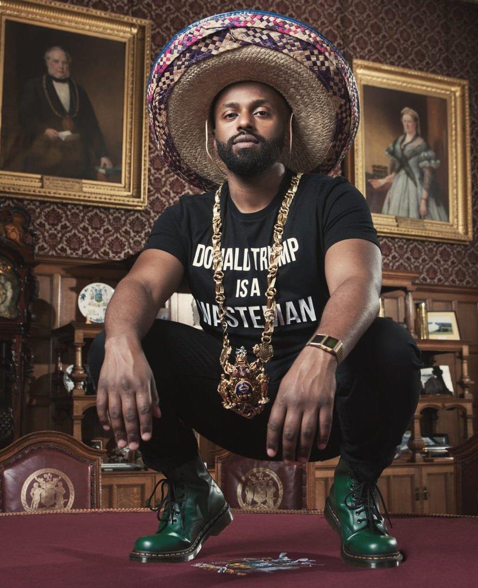 Magid Magid in 'Donald Trump is a wasteman' T-shirt