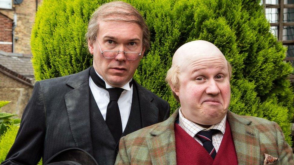 A scene from Pompidou with Alex MacQueen as Hove, butler to Pompidou played by Matt Lucas