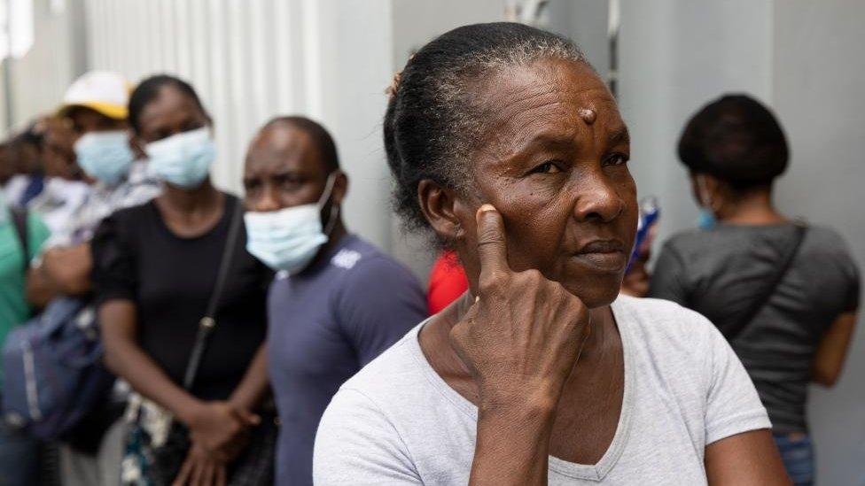 People wait for information about their missing relatives outside the Juan Pablo Pina Hospital, the day after an explosion occurred in San Cristobal, Dominican Republic - 15 August 2023.