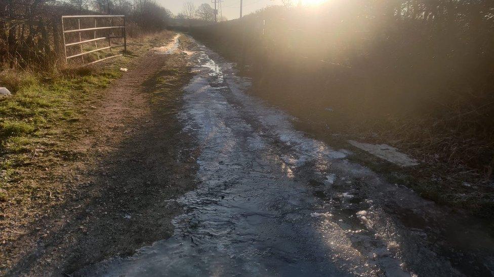 The stream of water coming off private land