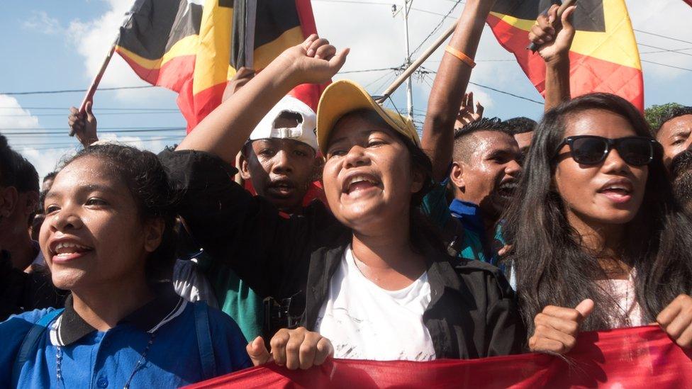 Some Timorese protesters carried signs urging Australia to "stop stealing our oil"