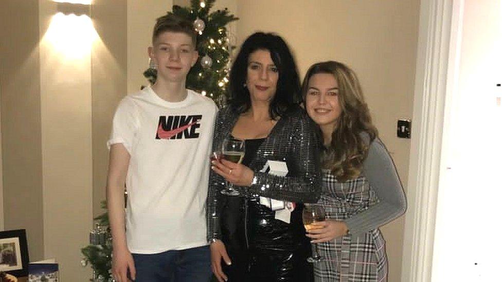 Steven McIlquham with his mum and sister in 2018