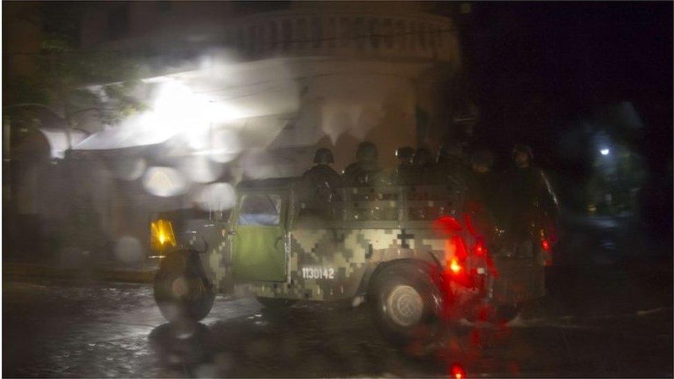 Mexican soldiers patrol streets during the arrival of hurricane Patricia in Puerto Vallarta, Mexico on October 23 ,2015