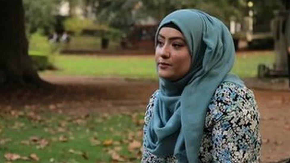 Academic Dr Suriyah Bi sitting in the park