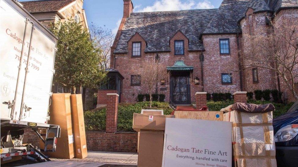 Moving trucks outside the Obama's home in late January, as he left office