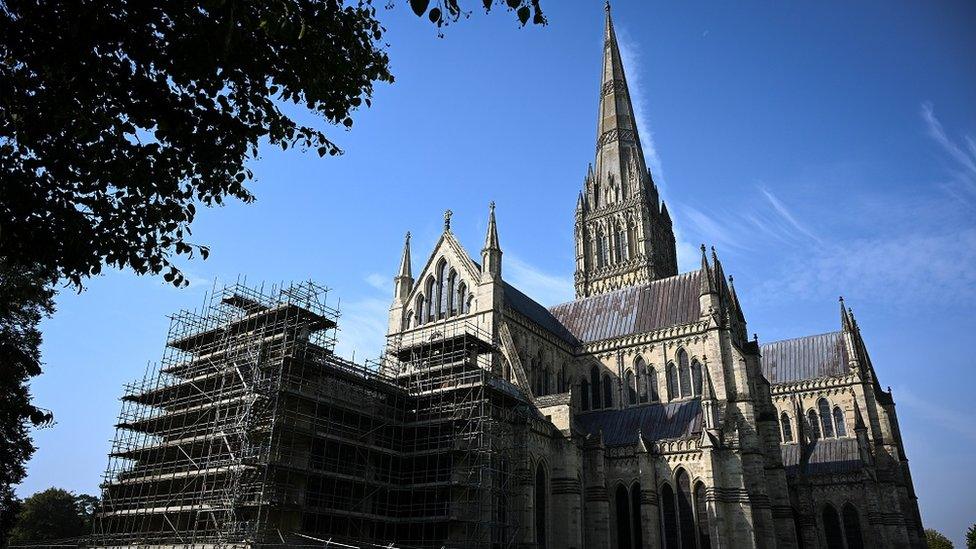 The cathedral from the bottom looking up, with a large amount of scaffolding on a section