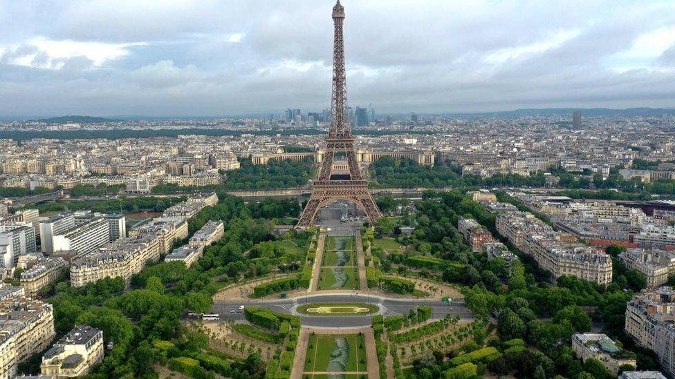 This aerial picture taken on June 13, 2019 shows a 600 meters long installation by French land artist SAYPE entitled "Beyong Walls"