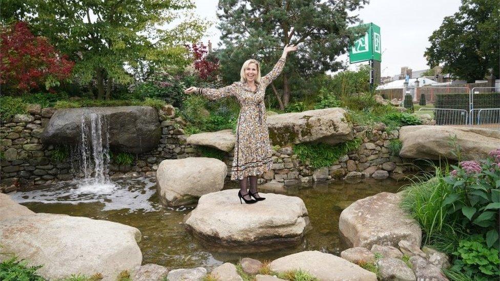 Actress Sally Phillips in the Psalm 23 garden at the RHS Chelsea Flower Show 2021