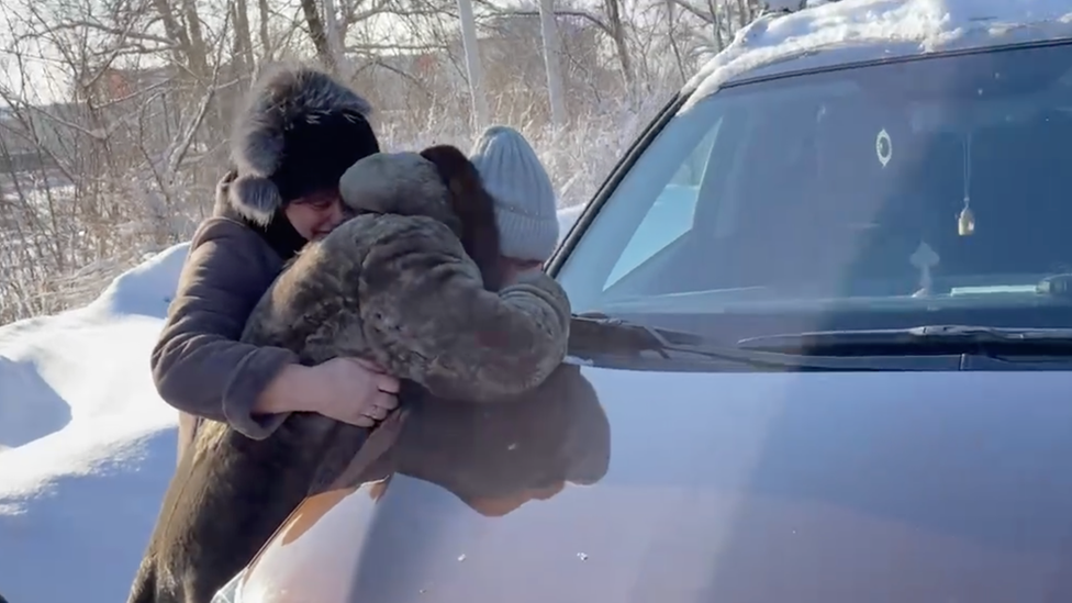 Relatives comforted each other at the mine entrance