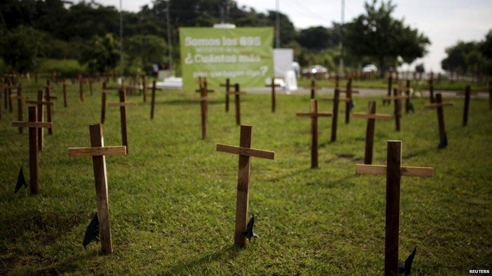 Crosses are left as a protest against the high homicide rate in the country in San Salvador, El Salvador on September 1, 2015. Members of a civilian group called "300" called the protest against homicides in El Salvador.