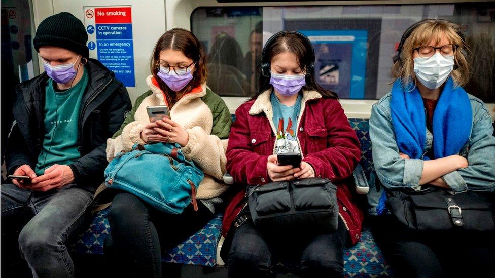 People on Victoria Line train