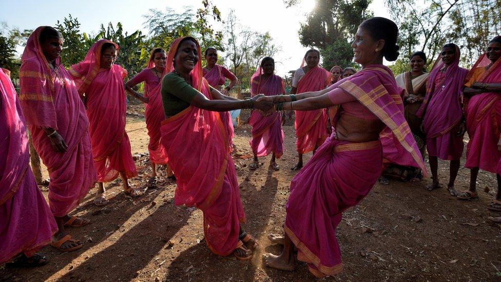 women dancing outside