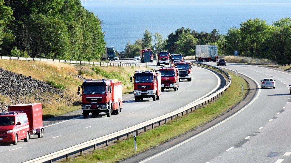 A convoy of Polish Fire Brigade passes lake Vattern on their way to Uppsala, after a rest and refuelling in Uppsala the Polish firefighters will continue during Sunday to central Sweden where they will help to put out the major wild fires