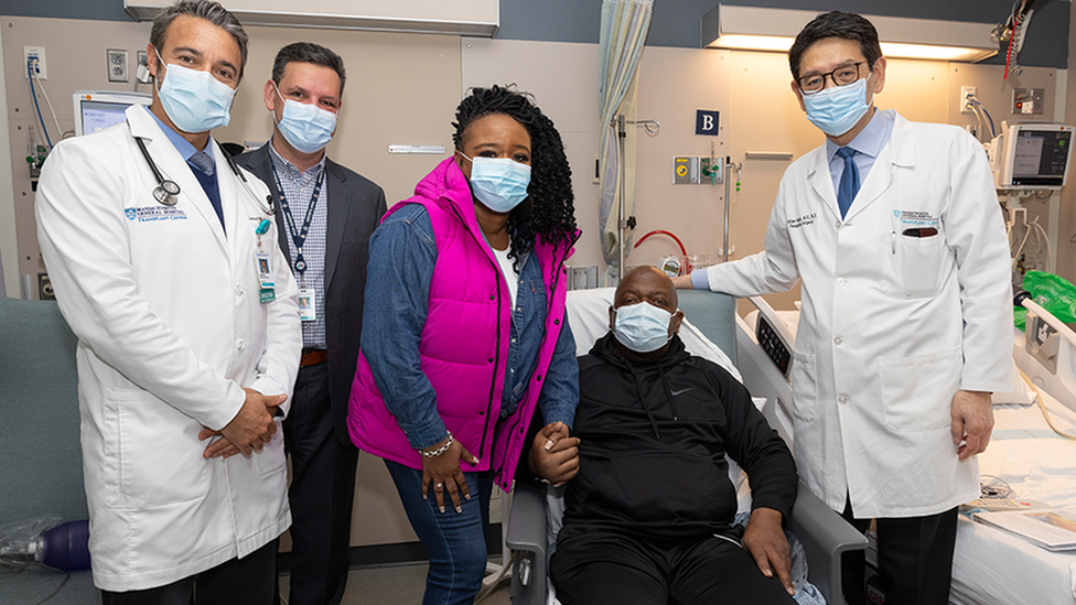 Rick Slayman (second from right) pictured here with his partner and team of doctors