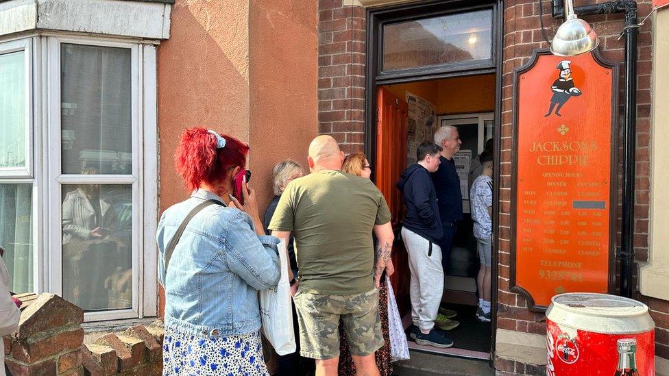 A queue outside the chip shop