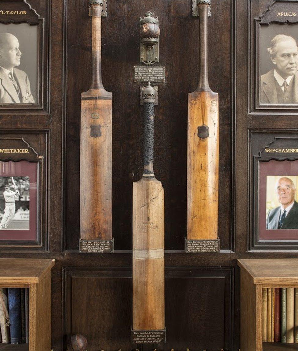 Cricket bats mounted in the principal room of Uppingham School's Cricket Pavilion