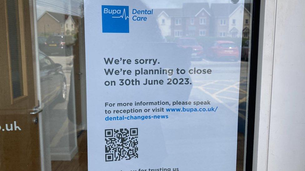 Sign of dental practice closing