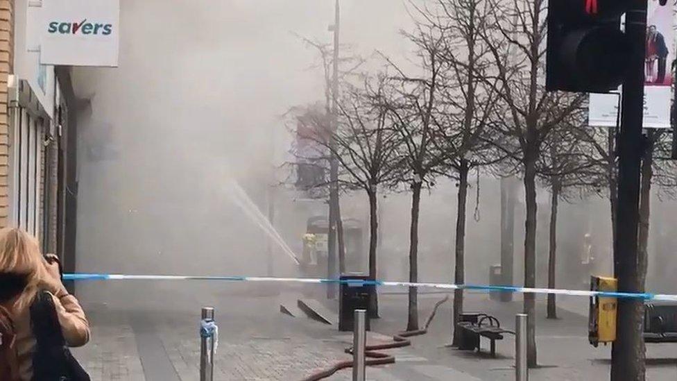 smoke filling the street